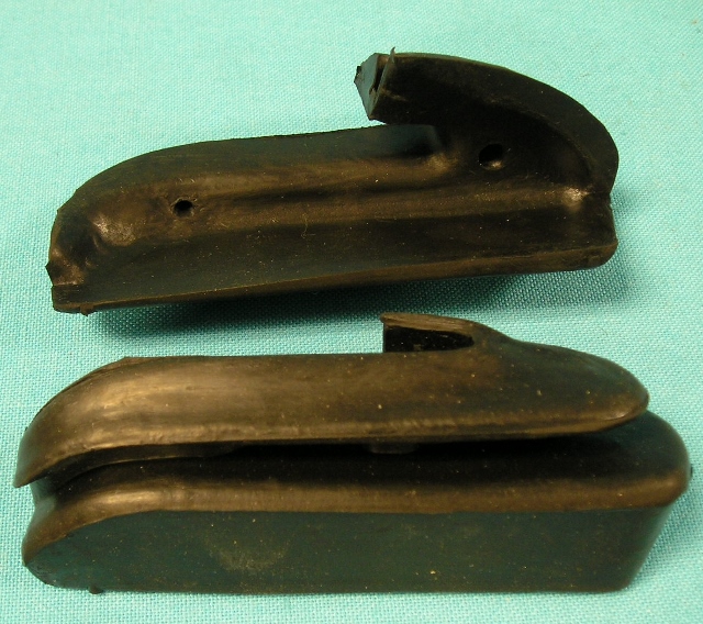Front bumper filler.  These are the small rubber pieces which fit into the corners of the bumper and prevent contact between the bumper and the corners of the front fenders.  Excellent reproductions, sold as a pair. (discount exempt)