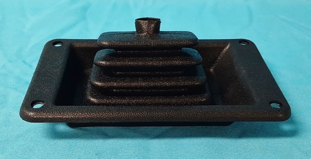 Upper console boot - Round Hole in boot.