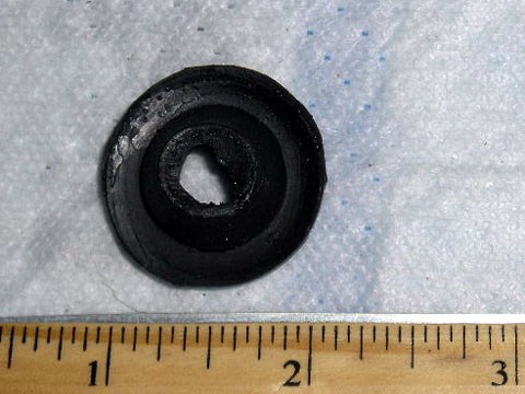Grommet in firewall for washer hose