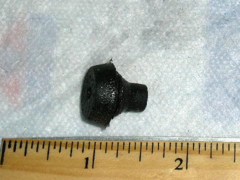 Rear license plate snubber