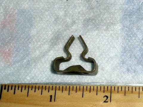 Rear license plate mounting clip