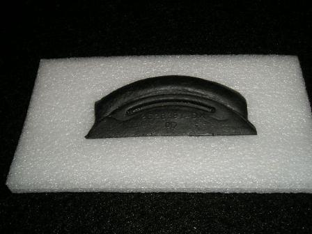 Center Rear Window Molding Pad - Rubber piece between the center rear window molding and the back glass