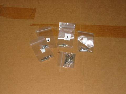 Exterior Screw kit - (12 screws)- 2 grille mldg., 4 backup light lens, 2 license light lens, 2 license light mounting and 2 mirror screws