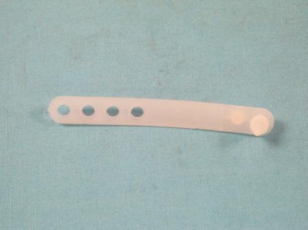 Reproduction white 3-1/2" wire strap. Multiple holes-wraps around & plugs back into itself. 4 hole strap - EACH -