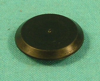 Flush sheet metal plug in black plastic 3/4"