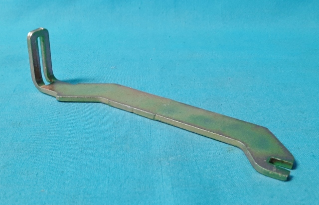 Parking Brake Strut (left side). These have an "L" shaped bend on one side for the brake shoe to fit into. Struts are yellow-cadmium plated. <b>Fits all models with 11" drums</b>.