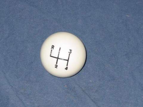 Hurst Shifter Knob Manual 4 Speed white with black lettering and coarse 3/8-16 thread pattern.