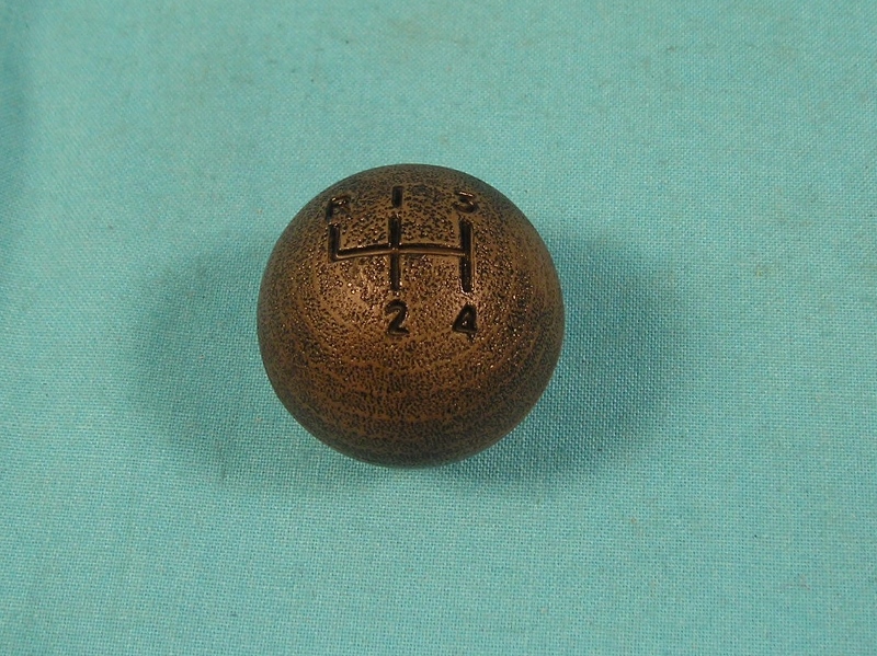 Hurst Shifter Knob - Reproduction of the plastic woodgrain knob for mid-1968 and all 1969 Hurst shifters. Correct texture and finish with 4-speed pattern. <b>Use with locknut (part #IN-003), not included</b>.