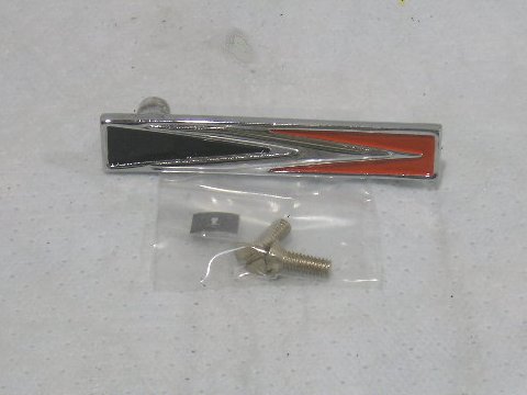 headlight door emblem "arrow" (except R/T & 500) .