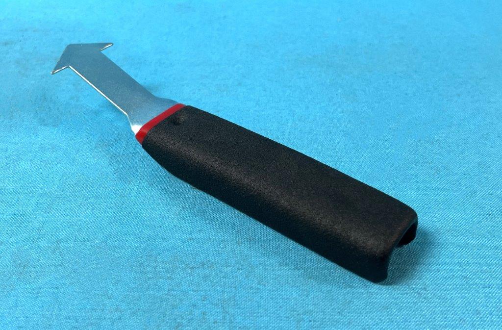Reveal Molding Removal Tool.  Removes clips and the rounded end spreads zipper-type rubber gaskets.