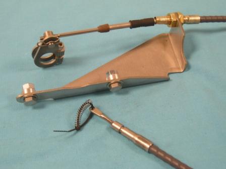 Console Conversion Cable Kit with IS cable.  This is an external mount with a "C" clip.  Early 65 year.  This kit is meant for those original cars equipped with the original style floor mounted console shifter and a 1966 and later style rear wheel drive torqueFlite tranny.  Discount exempt