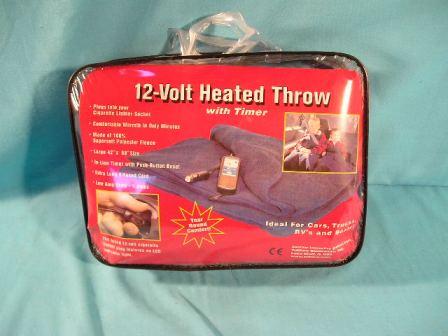 12-Volt Heated Travel Blanket - Ideal travel blanket for your loved one that hates to have the top down because its "too cold".  Now a solution, this 42" x 58" navy blue 100% high quality polyester fleece blanket is large enough for two people.   Also perfect for warming one bench seat or two bucket seats at a time.  Features an 8' long fused cord and automatic temperature control.
