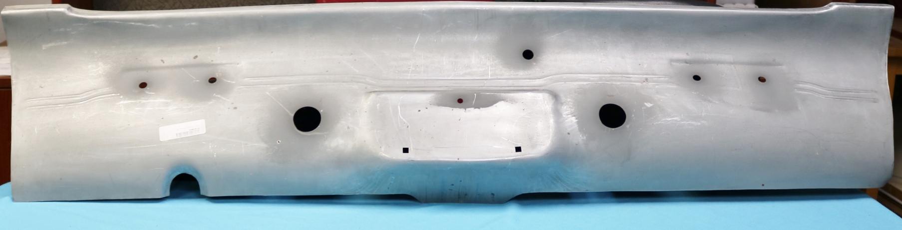 Rear Valance - Standard Drivers side exhaust cutout (Slant-Six and 2 bbl V8 cars)</B>Note: For 1967 and 1969 Barracuda owners only as the holes for the mounting of the backup assemblies are pre-drilled in this panel.  <b>