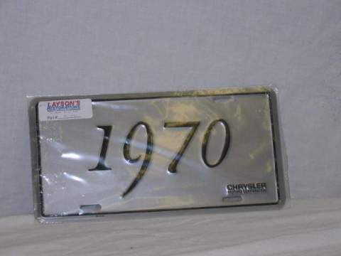 License Plate Silver plate, shows the year (1970) of the car in black script.