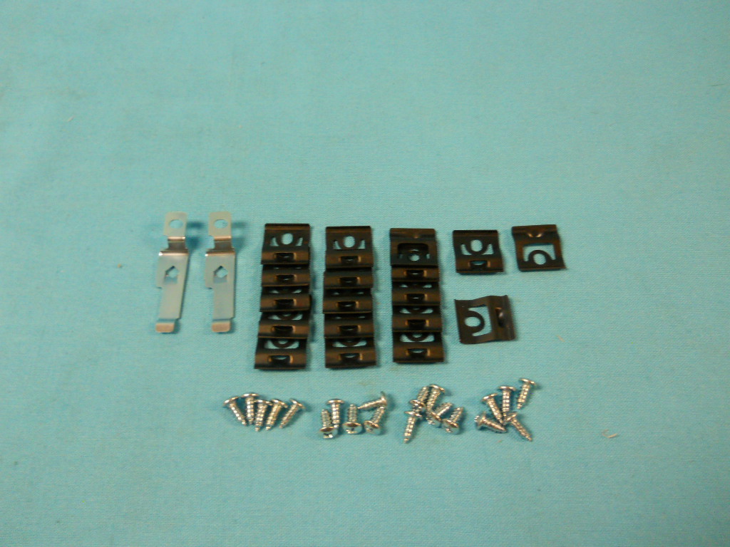 Rear Window Molding Clip Kit - These clips originally snapped into a stud that was welded onto the windshield (and rear window) frames, so that screws 
were not needed.  All of our kits come with screws so won't be exact as originals