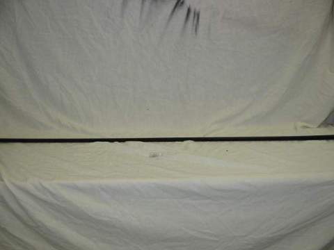 Interior Rear window lower section.  Black ribbed-plastic rear window lower trim piece.  Warm the trim piece in sunlight or immerse into a tub of hot tap water to make it pliable enough to snap into place.  Use with part #TP-MP5110, #MP-MP5101.