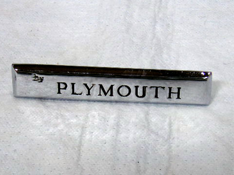 Trunk Nameplate "By Plymouth"- #2422 639.  Finding other applications for this emblem as well as time goes by...(2) pins on the back - measure 2-7/16" spacing between dead center of each pin.