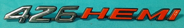 "426-Hemi" Hood nameplate <b>NON-shaker hood only</b> NOS 2998 765.  For Challenger With Rallye hoods and Chargers with Power Bulge Hoods. Sold each.