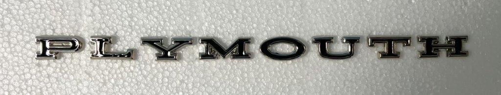 Barracuda trunk letter set "PLYMOUTH" .  For Hood Letters on 1966 year and for trunk letters for 1964-65 years.(Please note - the "M" on this letter set came with three different stud locations on the back of the "M" - (either across from each other (lower and upper version) or angled) - please indicate type you need when you order...This set comes standard with the "angled" type "M" - studs are offset from each other - not the straight accross version options).
