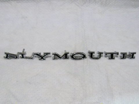 Trunk Letter Set "PLYMOUTH" - the "M" in this set can be different based on production location.  The "M" for this kit has the studs at the bottom backside of the "M" straight across from each other.  However, your "M" may have studs either straight across from each other at the top of the "M" on the backside - part #2528 977 or the studs are angled from each other one at the top and one at the bottom - part #381-49797.  Notify us at time of order if one of these other "M" are needed for your vehicle and we will swap it out.