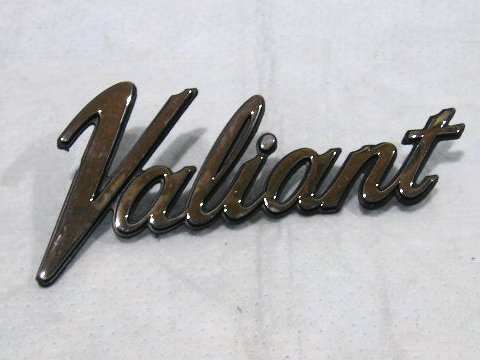 "Valiant" Fender nameplate. These fit only 4-door cars 1970-72 & ALL Valiant 1973-74. This emblem is NOT correct for "Scamp" models. Original part# 3504077 or 3680462.