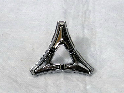 Triad emblem - Dodge triad logo emblem (located on the sail panel of models with vinyl top for 1969-70 Dart as well as some fenders on 70 Dart.). 1968 Dart trunk. Will also work on 1964-65 Coronet as fender emblem.  Also for 1970 Challenger Hood emblem for standard flat hoods or 70 Shaker hoods - NOT the R/T hood.