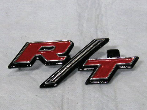 "R/T" grill / Headlight door nameplate. Use with #MR-VC120