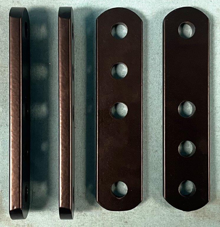 Adjustable leaf spring shackles for A, B, and E-body cars allow fine-tuning of your suspension and wheel clearance. <b>Set of 4</b>.  Powder coated.