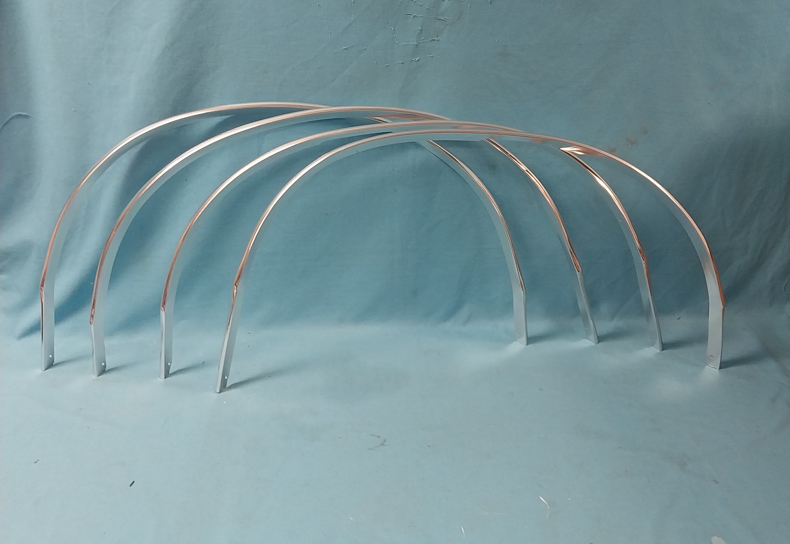 Complete set of all (4) Wheel Trim Mouldings (aluminum like originals).,...We are currently unable to ship complete sets for the drivers side rear is out of stock.  Anticipate more to arrive Mid Summer 2026.....