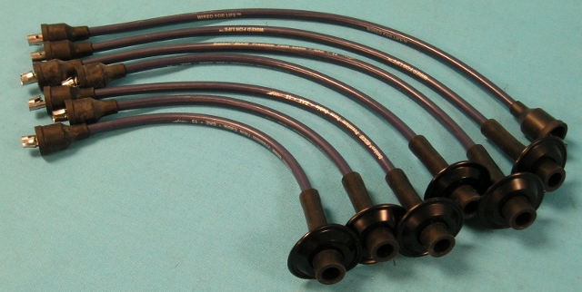 Slant-Six Plug Wire Set - aftermarket service replacement. 

Here we have New Aftermarket plug wire sets that are no longer available... Slant-Six 170 & 225 Engine Plug wire set with original looking dust boot covers at the spark plug wire heads.  These used on heads with the round metal cups for the spark plugs.