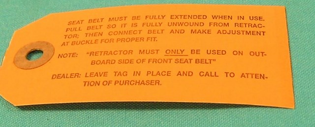 Seat belt instruction tag