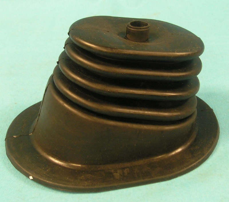 Shifter boot for Hurst shifter and no console. Rectangular hole. Use with #FS-511 trim ring.