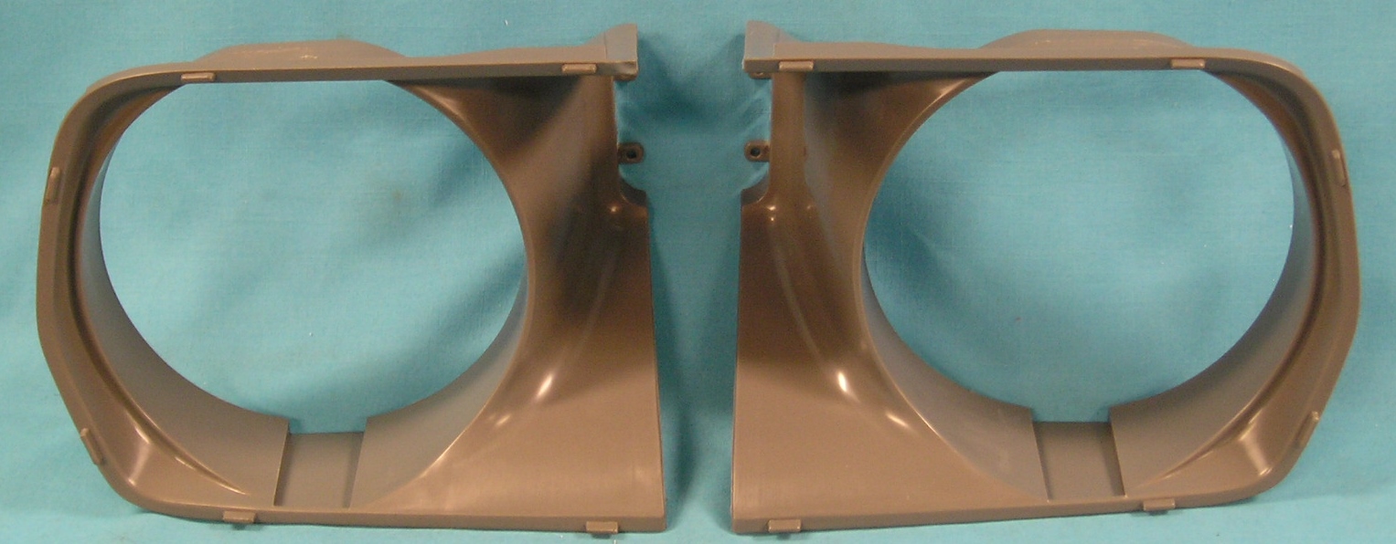Headlight Bezel. Price per Pair. for 1970 Cuda (injected molded Light Gray like originals)