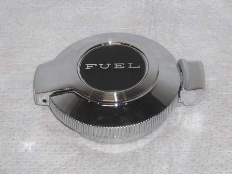 Flip Top Fuel Cap  
Black center with raised "FUEL" lettering.