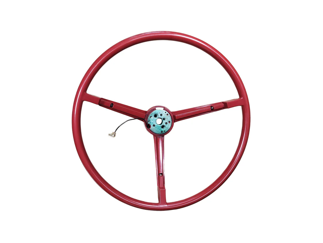 STEERING WHEEL - 3 spoke standard steering wheel – Red Color.  Will fit for 1967 but technically not correct.  Discount exempt