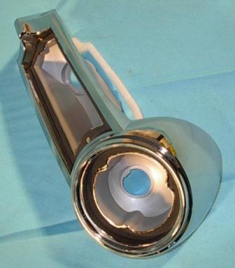 Passenger Side Taillight Bezel.  Comes with Black plastic taillight bezel to body gasket, the white foam underlayment gaskets, the red taillight lens gaskets and the round backup lens gaskets - all included.