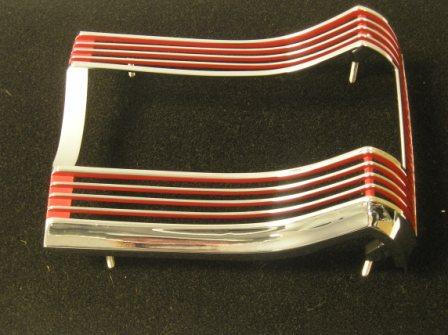 Tail light bezel - Passenger side.  Please Note:
The left side bezel was incorrectly labeled on the back as the right side and visa versa for the right side as well.  So what says "L" for left is actually the passenger "R" right side and visa versa.