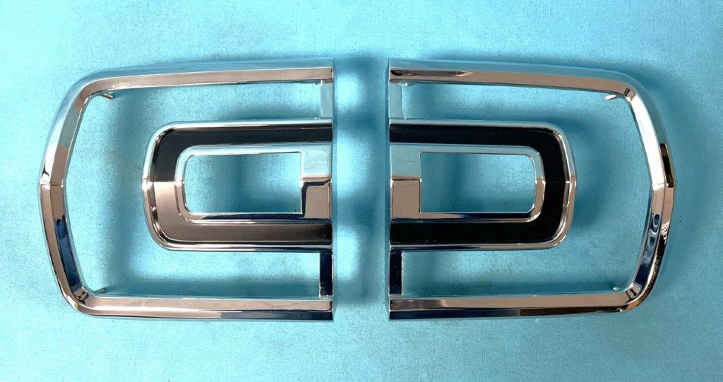 Pair of tailight bezels.  These are a high quality reproduction - NOT pot-metal reproductions like our competitors !!