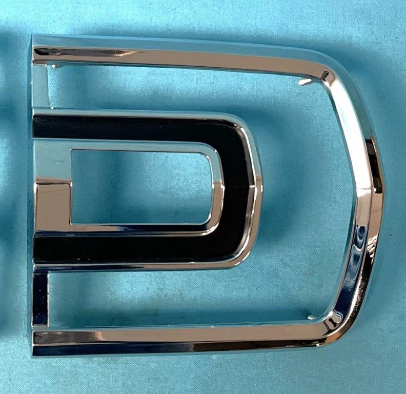 Passenger side tailight bezel