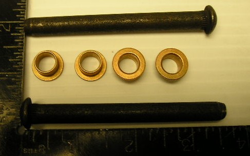 Door Hinge Repair Kit - Two 3-3/8" large pins and four bushings for one door.
