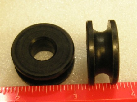 Quarter Window Roller Guide - Black - 1-1/16" diameter with 3/8" diameter center hole 
- Component of Quarter Window Roller Kit