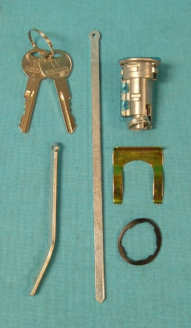 Trunk Lock Set - All models except 1970-72 Barracuda. This universal aftermarket trunk lock assembly includes lock cylinder, keys, 2 different length lock rods, 1 lock retainer, 1 gasket and OEM set of ketys for use on a variety of cars.