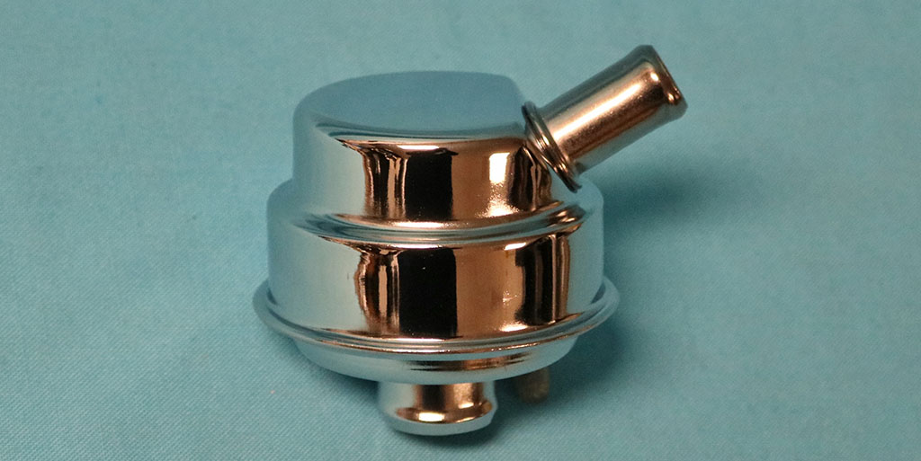 Breather Cap, New Chrysler chrome cap with vent tube should be used with our chrome valve cover sets (Part #344-45540). 
This item does not look original.