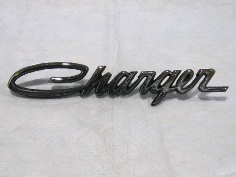 "Charger" roof nameplate. Use with #MR-VC124.  Chrysler part # P2841 886.  Tabs are 6" apart from each other.
