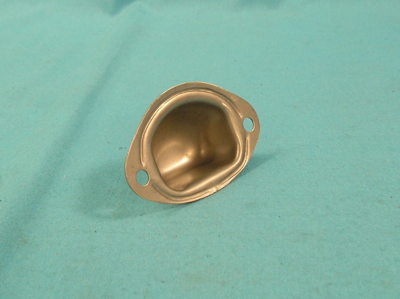 Metal cup (well)and gasket that fits into the intake.  manifold and houses the choke coil.  Big and small block engines.  Fits cast-iron manifolds only  - This is the well only