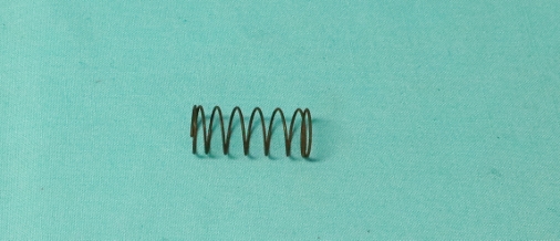 Shifter Button Return Spring.  New Chrysler return spring for the shift button #MN-MS272.  Mounts inside the knob on part #EQ-713K to keep tension on the button - discount exempt