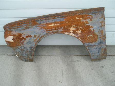 Drivers side Front fender.  Some bondo repairs in past - not bad or very thick.  Fender stripped of paint in 2011.  West Coast fender - no other rust other than visual surface rust from stripping.  Formual S fender emblem holes on fender.