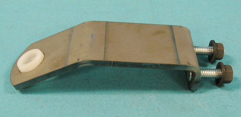 Torque Bracket - for all floor mounted “T-Handle” shifted automatics. New Lower Gearshift Control Torque Bracket for Auto Trans. Floor shift cars.
Comes complete with correct coni keps nuts and current production bushing. (current bushings are blue and not the same physical shape as those produced in the
1960’s-70’s)  Mounts to automatic transmission housing and is necessary for all floor mounted shifter applications