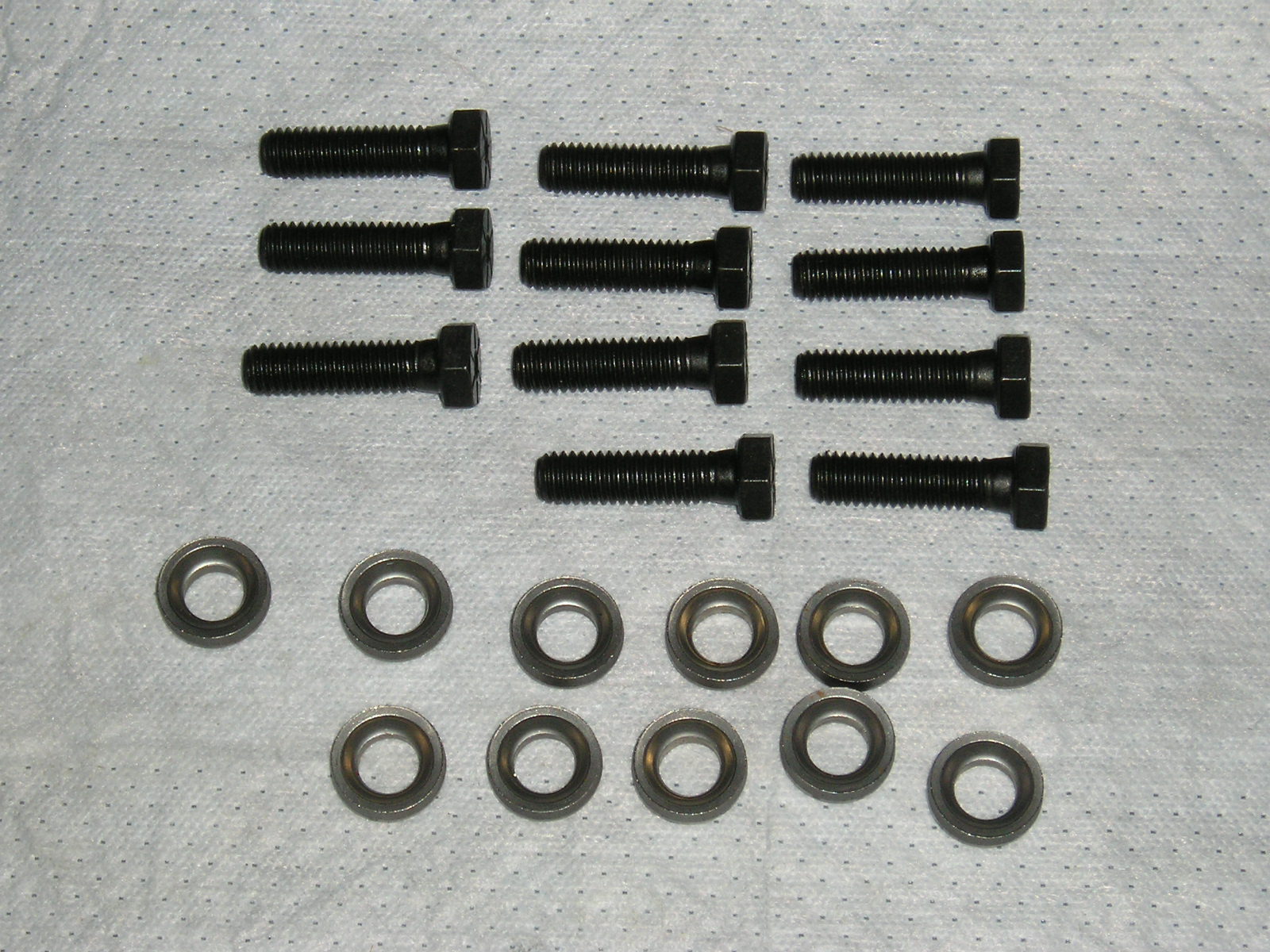 426 HEMI Exhaust Manifold Fastener Kit.  Includes: (11) correct head marking bolts and conical washers